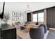 Modern living room featuring stylish seating, contemporary lighting, and elegant decor at 8148 Ebaugh Dr, Camby, IN 46113