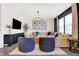 Stylish living room featuring a large sectional sofa, modern lighting, and elegant decor at 8148 Ebaugh Dr, Camby, IN 46113