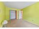 Bedroom with bright walls, closet, and a window for natural light at 817 Delray Dr, Indianapolis, IN 46241
