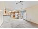 Open concept living room with dining area and kitchen featuring light-colored cabinets at 817 Delray Dr, Indianapolis, IN 46241