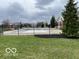 Community pool with fenced in area and plenty of seating at 8654 Arailia Dr, Plainfield, IN 46168