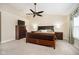 Main bedroom with vaulted ceiling, fan, and luxury furniture at 8654 Arailia Dr, Plainfield, IN 46168