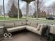 Cozy screened porch featuring an outdoor couch, perfect for relaxing at 8654 Arailia Dr, Plainfield, IN 46168