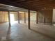 Unfinished basement with concrete floor, exposed beams, and visible utilities, ready for customization at 9107 Tenor Way, Indianapolis, IN 46231