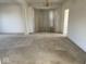 Open living room featuring large window and carpet flooring at 9107 Tenor Way, Indianapolis, IN 46231