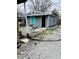 Exterior view of a detached garage or shed offering additional storage space on the property at 945 N Ewing St, Indianapolis, IN 46201