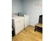 Laundry room with white washer and dryer set at 945 N Ewing St, Indianapolis, IN 46201