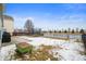 Large fenced backyard with a green lawn, patio area, and space for recreation at 9698 W Lantern Ln, Pendleton, IN 46064
