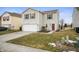 Charming two-story home featuring tidy front lawn, attached garage, and well-kept landscaping at 9698 W Lantern Ln, Pendleton, IN 46064