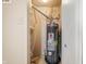 Utility closet featuring a hot water heater and furnace at 9698 W Lantern Ln, Pendleton, IN 46064