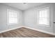 Comfortable bedroom featuring a window and neutral paint at 1130 E Bradbury Ave, Indianapolis, IN 46203