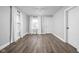 Bright living room with modern wood flooring and a lot of natural light at 1130 E Bradbury Ave, Indianapolis, IN 46203