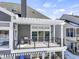 Back deck with grill and modern railing, covered by a pergola at 11338 Bayhill Way, Indianapolis, IN 46236
