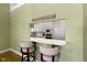 Kitchen bar area with seating and a view into the bright, modern kitchen at 11338 Bayhill Way, Indianapolis, IN 46236