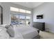 Inviting main bedroom with a large window showcasing lake views and lots of natural light at 11338 Bayhill Way, Indianapolis, IN 46236