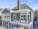 Stunning two-story home with a deck, pergola, and walkout basement overlooking the frozen lake at 11338 Bayhill Way, Indianapolis, IN 46236
