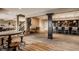 Spacious basement with a stylish bar area, game tables, and ample room for entertaining at 11573 Bent Tree Ct, Zionsville, IN 46077