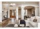 Open-concept space with a view of the foyer, dining area, and an abundance of natural light at 11573 Bent Tree Ct, Zionsville, IN 46077