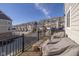 Relaxing outdoor balcony offers seating and views of the neighborhood for comfortable outdoor living at 1208 Chapman Dr, Westfield, IN 46074