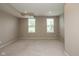 A spacious basement features neutral paint and carpet, recessed lighting and two large windows at 1208 Chapman Dr, Westfield, IN 46074