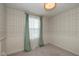 A bright bedroom featuring stylish wallpaper, white trim, a window and a ceiling light fixture at 1208 Chapman Dr, Westfield, IN 46074