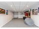 Spacious finished basement featuring a recreation area with a kitchenette and comfortable seating at 12107 Castle Row Overlook, Carmel, IN 46033