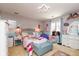 Cozy bedroom featuring whimsical decor, soft lighting, and ample closet space at 12107 Castle Row Overlook, Carmel, IN 46033