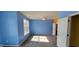 Bedroom featuring neutral carpet, ceiling fan, and a large window at 1223 Blackthorne S Trl, Plainfield, IN 46168