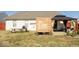 Well-kept backyard includes a patio, privacy fence, and barbecue area, ideal for outdoor gatherings at 12329 Wolf Run Rd, Noblesville, IN 46060