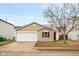 Charming single-story home featuring a two-car garage and low-maintenance landscaping at 13332 N Brick Chapel Dr, Camby, IN 46113