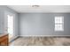Eat-in kitchen features updated flooring, a window, and a door to the outside at 13332 N Brick Chapel Dr, Camby, IN 46113