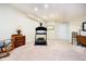 Finished basement featuring carpeting and exercise equipment, perfect for a home gym at 14020 Quarter Horse Ct, Carmel, IN 46032
