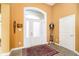 Warm foyer with tile flooring, a patterned rug, and lots of natural light at 14020 Quarter Horse Ct, Carmel, IN 46032