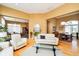 Spacious living room featuring a large window and a seamless flow to the dining area at 14020 Quarter Horse Ct, Carmel, IN 46032