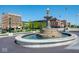 Scenic town square fountain with decorative sculpture and clear blue water, surrounded by historic buildings at 1404 Bluebonnet Pl, Shelbyville, IN 46176