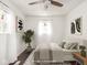 Comfortable bedroom with neutral tones, hardwood floors, and lots of natural light at 1420 E Market St, Indianapolis, IN 46201