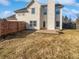 Backyard with a wood deck and partial fence at 1535 Arbor Springs Dr, Brownsburg, IN 46112