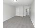 Bedroom featuring neutral carpet, a closet, and an open door at 1535 Arbor Springs Dr, Brownsburg, IN 46112