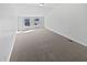 Bedroom with carpet, two windows, and sloped ceiling at 1535 Arbor Springs Dr, Brownsburg, IN 46112
