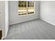 Neutral bedroom with a window at 1535 Arbor Springs Dr, Brownsburg, IN 46112