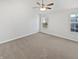 A spacious bedroom is freshly painted with neutral carpet and natural light at 1535 Arbor Springs Dr, Brownsburg, IN 46112