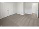 Bedroom with carpet and double doors to the closet at 1535 Arbor Springs Dr, Brownsburg, IN 46112