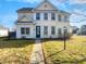 Inviting two-story home featuring a well-maintained lawn and classic architectural details at 1535 Arbor Springs Dr, Brownsburg, IN 46112