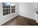 Bright kitchen area featuring wood-look flooring and a large window at 1535 Arbor Springs Dr, Brownsburg, IN 46112