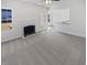 A spacious living room is freshly painted with neutral carpet and natural light at 1535 Arbor Springs Dr, Brownsburg, IN 46112