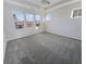 Sunlit main bedroom boasting tray ceilings and ample space for relaxation at 1670 Rossmay Dr, Westfield, IN 46074