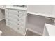 Organized walk-in closet with built-in drawers and shelving for optimal storage at 1670 Rossmay Dr, Westfield, IN 46074