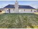 Spacious backyard with a lush lawn and view of the home's rear exterior at 170 Trails End, Brownsburg, IN 46112