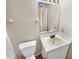 Bathroom featuring tile flooring, white vanity, mirror, and toilet at 170 Trails End, Brownsburg, IN 46112