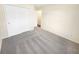 Bedroom featuring neutral walls, plush carpet and a large closet at 170 Trails End, Brownsburg, IN 46112